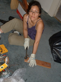 janeen pulling nails out of every tiny piece of wood