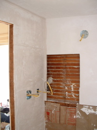 plaster on plug wall